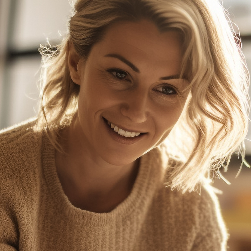 AI-generated photograph of a young elementary school teacher, representing the secondary target audience for this UX project.